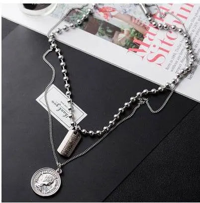Hiphop pendant titanium steel chain pendant for men and women - pluto essentials