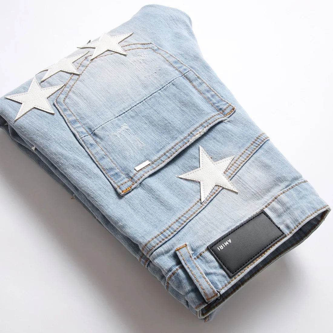 Five-Pointed Star ripped jeans - pluto essentials 