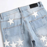 Five-Pointed Star ripped jeans - pluto essentials 