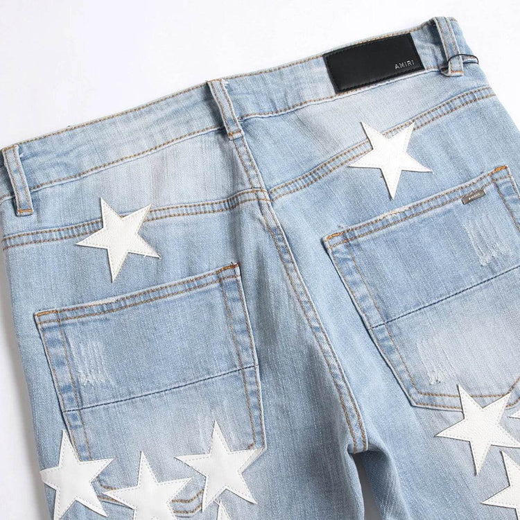 Five-Pointed Star ripped jeans - pluto essentials 