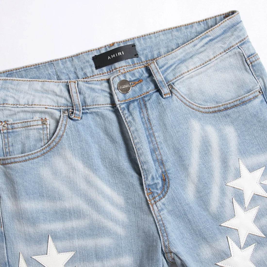 Five-Pointed Star ripped jeans - pluto essentials 