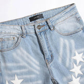 Five-Pointed Star ripped jeans - pluto essentials 