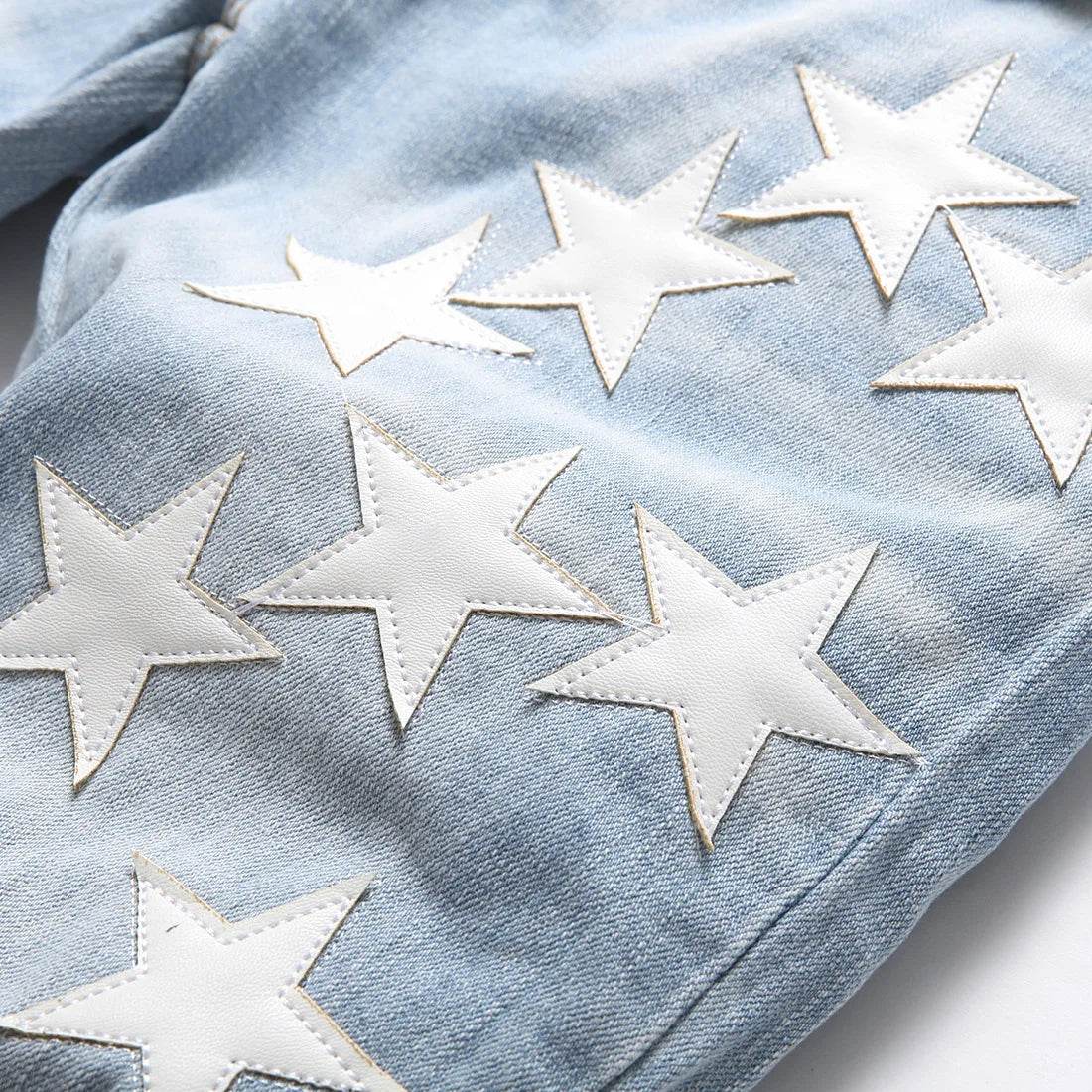 Five-Pointed Star ripped jeans - pluto essentials 