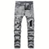 custom ripped jeans (patched black) - pluto essentials 